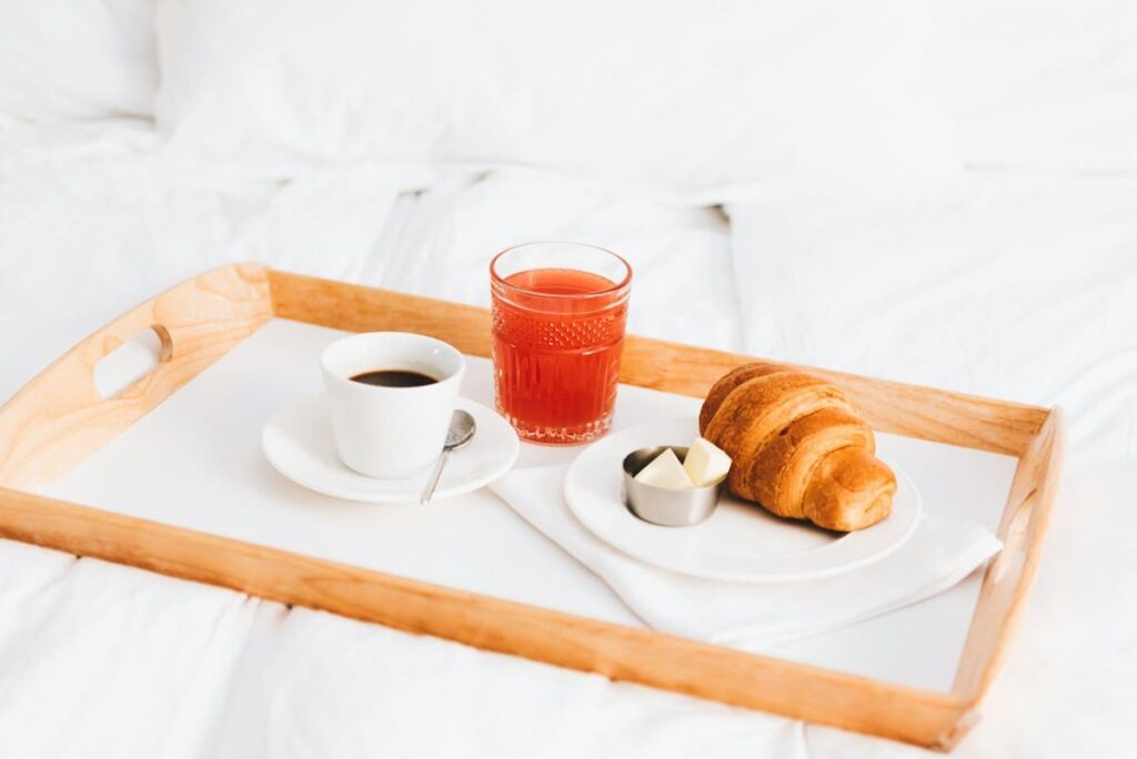 Toast and a cup of tea on a white plate