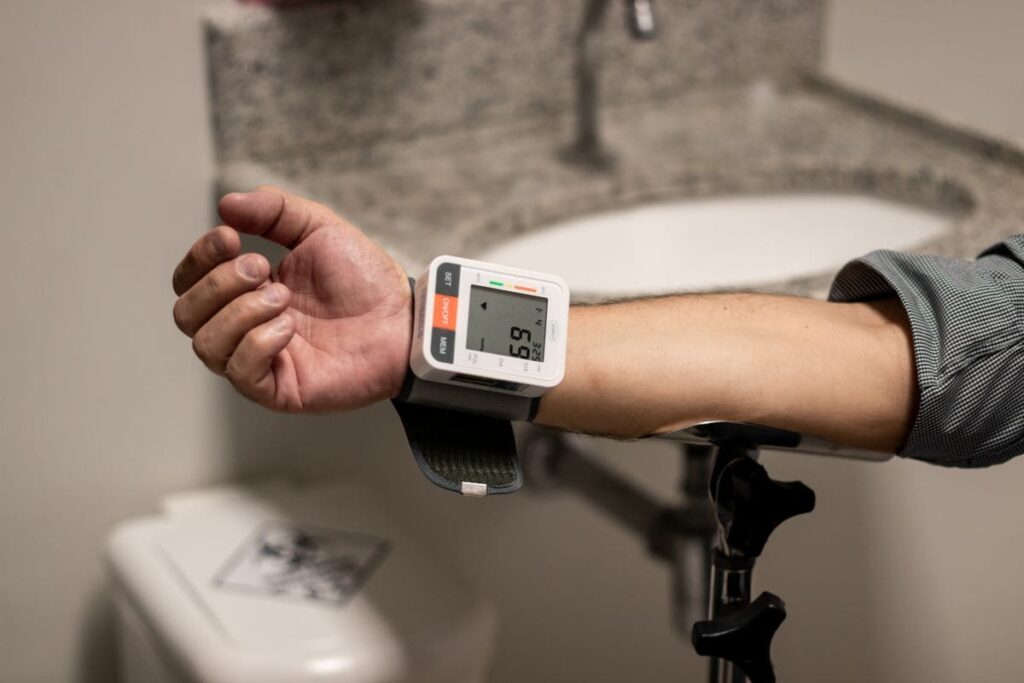 Wrist blood pressure monitor on an arm