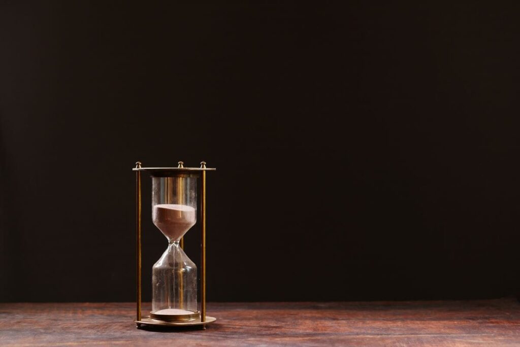 Hourglass with sand trickling through