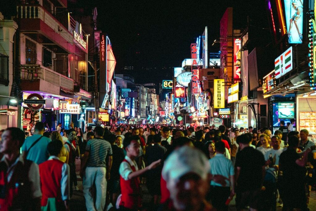 Neon signs lighting up Walking Street in Pattaya at night