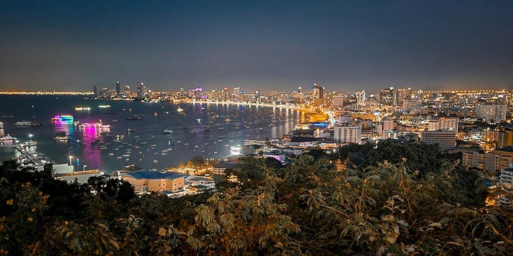 Pattaya city lights seen from a hilltop at night