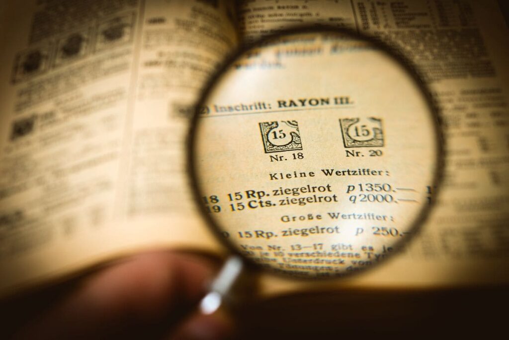 Magnifying glass over a page of printed text